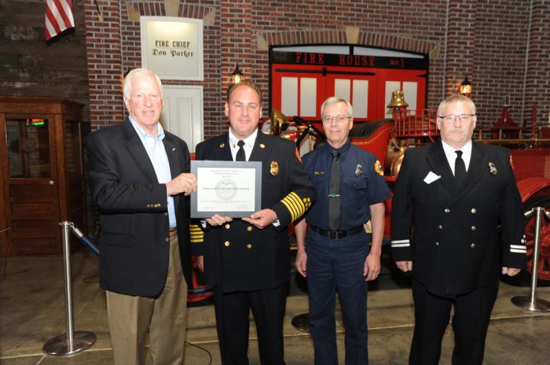 ​Mike Thompson presenting Public Safety Hero Award to Kenwood Fire Protection District