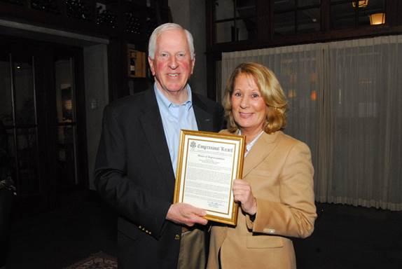 Rep. Thompson presents a certificate of Congressional recognition to Cakebread.