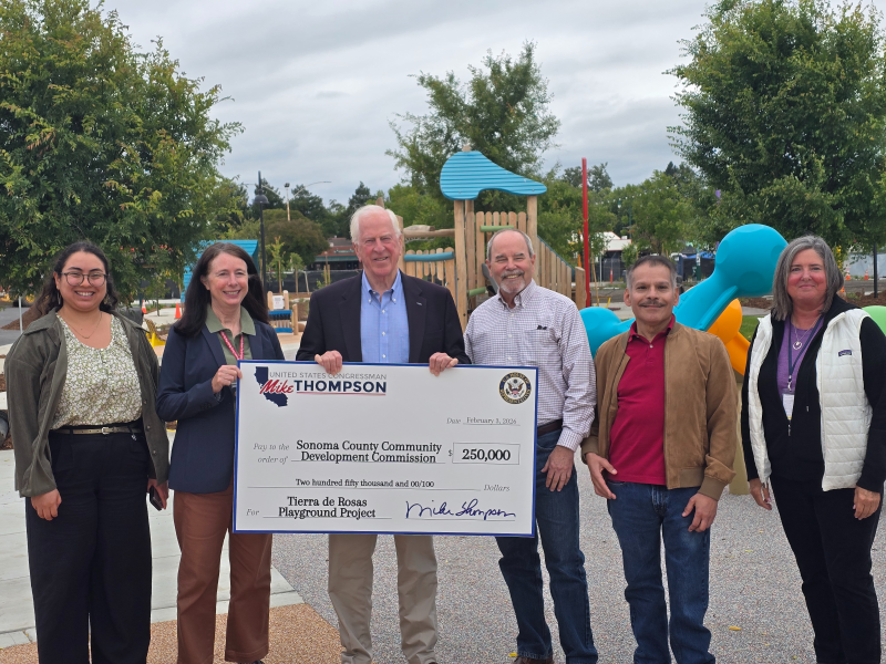 Thompson Presents $250,000 Check to Build Playground in Roseland